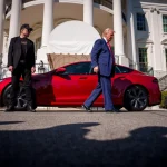 2605587-donald-trump-tesla